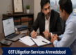 A professional GST litigation lawyer in Ahmedabad reviewing tax notice documents